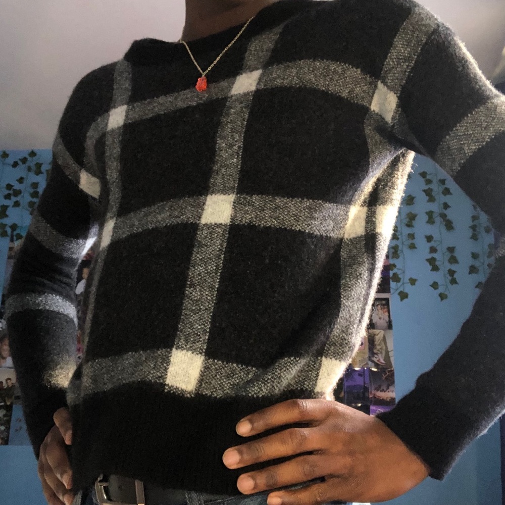black, white, and grey sweater